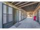 Exterior walkway featuring secure door, and a cozy ambiance at 2700 S Holly St # 107, Denver, CO 80222