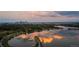 Panoramic aerial view of the cityscape reflected in the lake at sunset at 2305 Quitman St, Denver, CO 80212