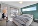 Bright and airy bedroom with a modern design, large window, and access to a private balcony at 2305 Quitman St, Denver, CO 80212