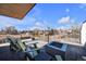 Relaxing rooftop deck with comfortable outdoor seating, a fire pit and panoramic views of the surrounding neighborhood at 2305 Quitman St, Denver, CO 80212