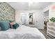 Comfortable bedroom with en-suite bathroom and closet, providing convenience and privacy at 2985 W 46Th Ave, Denver, CO 80211