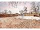 Large backyard featuring a shed, a wooden fence, and ample space for outdoor activities at 2852 W Ellsworth Ave, Denver, CO 80219