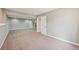 This large basement has neutral carpet, light gray walls and recessed lighting at 17476 E Bellewood Cir, Aurora, CO 80015