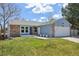 Charming single-Gathering home with brick and blue facade, well-kept lawn, and inviting entryway at 17476 E Bellewood Cir, Aurora, CO 80015