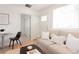 Cozy living room with comfortable beige sofa and bright natural light at 3903 W Nevada Pl, Denver, CO 80219