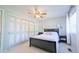 Main bedroom with ceiling fan, double bed, and large closet at 2519 S Sable Way, Aurora, CO 80014