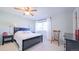 Main bedroom with ceiling fan, double bed and nightstand at 2519 S Sable Way, Aurora, CO 80014