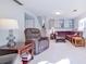 Gathering room with fireplace, sectional sofa, and built-in shelving at 2519 S Sable Way, Aurora, CO 80014