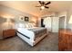 Cozy bedroom featuring neutral colors, a comfortable bed, and ample natural light at 1625 Adobe Pl, Highlands Ranch, CO 80126