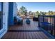 Outdoor deck featuring comfortable seating, a fire pit, and scenic views, perfect for relaxation and entertaining at 1625 Adobe Pl, Highlands Ranch, CO 80126