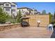Cozy backyard with a concrete patio, stylish privacy fence, and a comfortable porch swing at 15179 W Washburn Ave, Lakewood, CO 80228