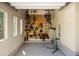 Well-organized garage with bike racks and a pegboard for tools and accessories at 15179 W Washburn Ave, Lakewood, CO 80228