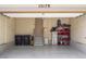 Clean, spacious garage with an organized storage system and access to the home at 15179 W Washburn Ave, Lakewood, CO 80228