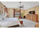 Spacious bedroom with a ceiling fan and large windows offering scenic views at 2094 Lost Canyon Ranch Ct, Castle Rock, CO 80104