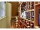 Wine cellar showcasing custom wooden racks filled with a variety of wine bottles at 2094 Lost Canyon Ranch Ct, Castle Rock, CO 80104
