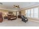 Spacious main bedroom with plantation shutters, neutral paint, and comfortable furnishings at 6761 Mary Ct, Castle Pines, CO 80108