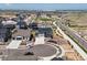 This aerial view shows the layout of the community with green spaces and sidewalks for pedestrians at 3453 N Gold Bug Ct, Aurora, CO 80019