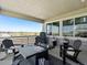 Covered patio has outdoor seating, a fire pit, and neighborhood views at 3453 N Gold Bug Ct, Aurora, CO 80019