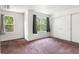 Bright bedroom with carpet, natural light, and closet at 5168 Goshawk St, Brighton, CO 80601