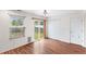 Inviting room with large window and sliding glass door to the backyard at 5168 Goshawk St, Brighton, CO 80601