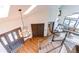 Grand entryway with high ceilings, hardwood floors, chandelier, and staircase leading to the upper level at 10393 Deerfield Rd, Franktown, CO 80116