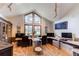 Spacious home office with large windows, custom cabinets, and ample workspace at 10393 Deerfield Rd, Franktown, CO 80116