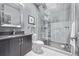 Bathroom featuring sleek glass shower enclosure, modern fixtures, and contemporary design at 3339 Tejon St, Denver, CO 80211