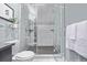 Bathroom walk in shower is enclosed with glass, and features modern fixtures and decor at 3339 Tejon St, Denver, CO 80211