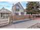 The house shows an attractive fence and updated exterior at 3339 Tejon St, Denver, CO 80211