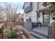 Updated home exterior with a stylish fence and well-maintained yard at 3339 Tejon St, Denver, CO 80211