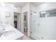 Bright bathroom featuring double vanity and a glass-enclosed shower at 2572 Iola St, Aurora, CO 80010