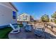 Backyard featuring a seating area with stone pavers and a fire pit at 3375 Starry Night Loop, Castle Rock, CO 80109