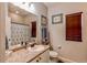 Well-lit bathroom with a vanity, framed mirror, framed art and decorative accents at 3375 Starry Night Loop, Castle Rock, CO 80109