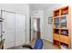 Bright carpeted room with closet and light wood display shelves at 3375 Starry Night Loop, Castle Rock, CO 80109