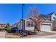 A cozy single-Gathering home featuring a deck and a manicured front yard at 3375 Starry Night Loop, Castle Rock, CO 80109