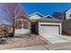 Charming single-Gathering home with a well-maintained lawn and a two-car garage at 3375 Starry Night Loop, Castle Rock, CO 80109