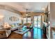 Inviting living room filled with natural light, comfortable seating, fireplace and hardwood floors at 3375 Starry Night Loop, Castle Rock, CO 80109