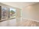 Bright living room featuring large windows and hardwood flooring at 701 E 24Th Ave, Denver, CO 80205
