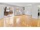 Bedroom featuring parquet floors, built-in white storage cabinets, and sliding doors to a balcony at 12655 W Bayaud Ave # 40, Lakewood, CO 80228