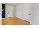 Bedroom featuring parquet floors and closet with bi-fold doors at 12655 W Bayaud Ave # 40, Lakewood, CO 80228