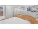 A cozy bedroom with hardwood floors, large closets, and bright white walls at 12655 W Bayaud Ave # 40, Lakewood, CO 80228