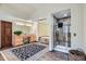 Bright bathroom with a double vanity, a walk-in shower, and a large soaking tub at 1662 Gore Dr, Larkspur, CO 80118