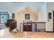 Grand foyer with soaring ceilings, hardwood floors, and a staircase showcasing elegant architectural design at 1662 Gore Dr, Larkspur, CO 80118