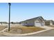 Well-maintained single story home with a two-car garage, landscaping, and a white picket fence at 6320 Indian Paintbrush St # 108, Frederick, CO 80530