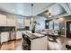 Contemporary kitchen with stainless steel appliances, dark backsplash, and open layout at 6320 Indian Paintbrush St # 108, Frederick, CO 80530