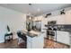 Modern kitchen with stainless steel appliances and sleek countertops at 6320 Indian Paintbrush St # 108, Frederick, CO 80530