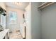 Well-lit laundry room with modern appliances and ample storage at 6320 Indian Paintbrush St # 108, Frederick, CO 80530