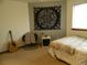 Bedroom with carpet, natural light, large tapestry and artistic accents at 9684 W Long Dr, Littleton, CO 80123