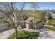 Charming home showcasing its well-manicured lawn, beautiful landscaping, and inviting curb appeal at 9684 W Long Dr, Littleton, CO 80123