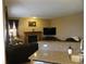Comfortable living room with fireplace and plush seating, perfect for relaxation at 9684 W Long Dr, Littleton, CO 80123
